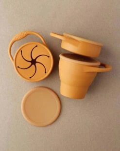 Foldable Silicone Snack Cup In Golden Ochre