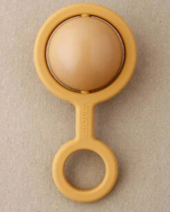 Ora Rattle Toy In Mustard