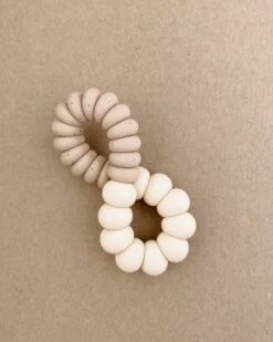 Twist Freezer Teether In Speckled Vanilla